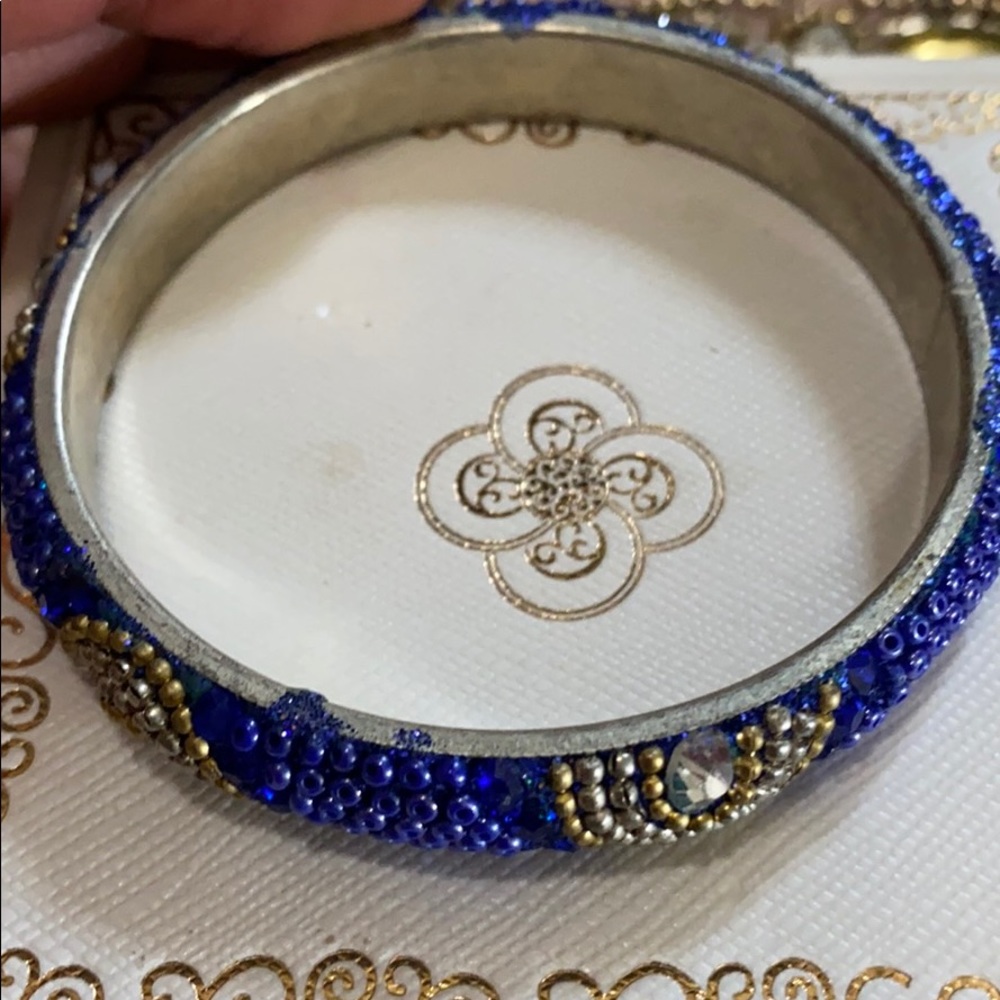 Blue white and gold beaded bracelet